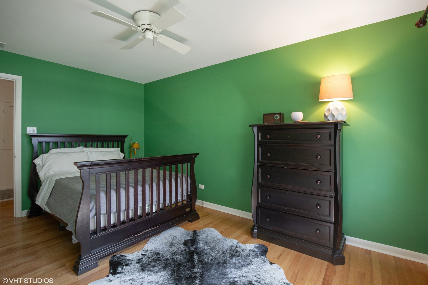 650 Garfield Avenue Lake Bluff, IL 60044 - Photo 11 of 25 a bedroom with a bed and a dresser