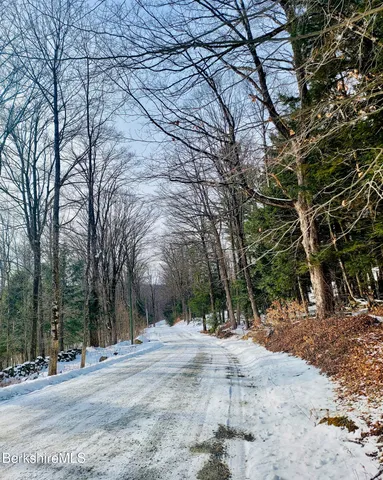 a view of road with trees