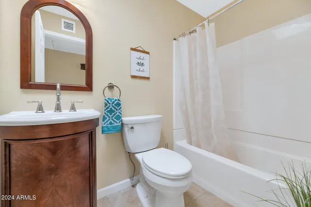 a view of a backyard with potted plants