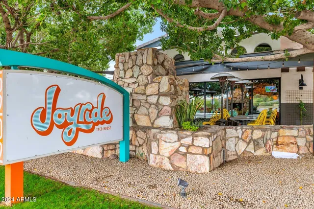 a view of a building with a street