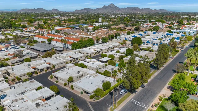 an aerial view of a city with lots of residential buildings