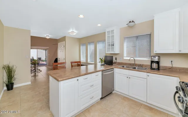 a kitchen with a stove and a microwave