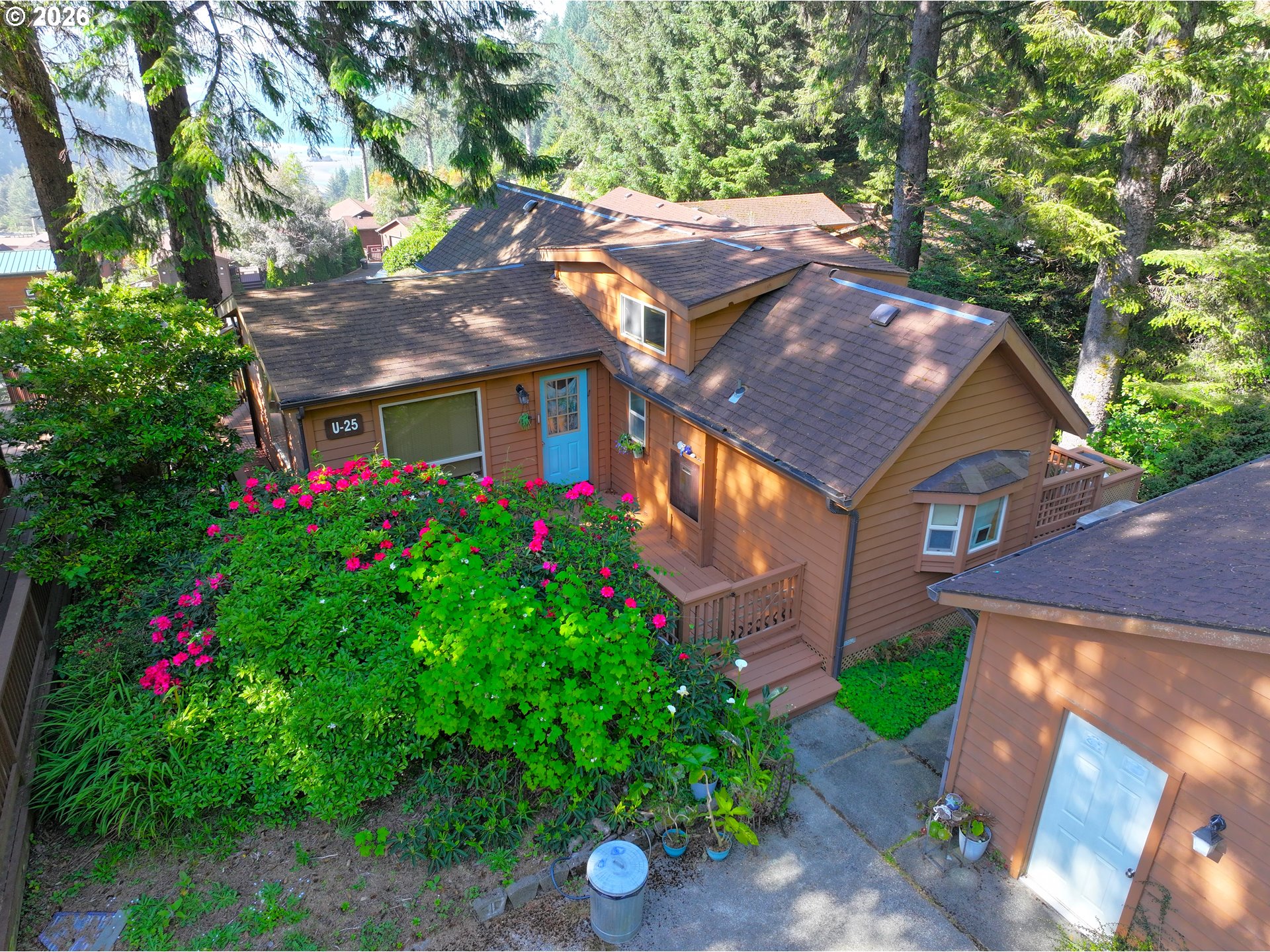 19921 Whaleshead Road, Unit U25 Brookings, OR 97415 - Photo 7 of 47 a front view of house with yard and green space