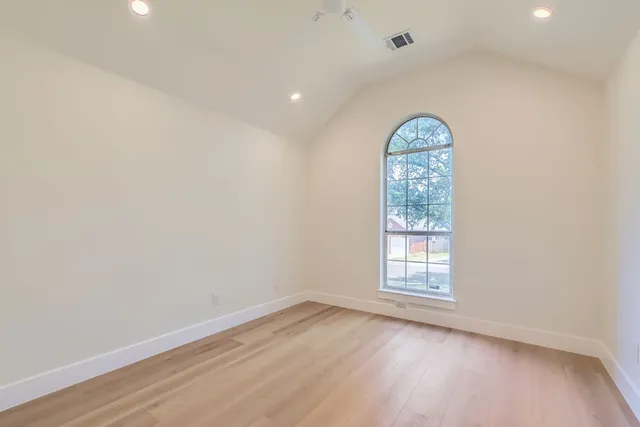an empty room with window