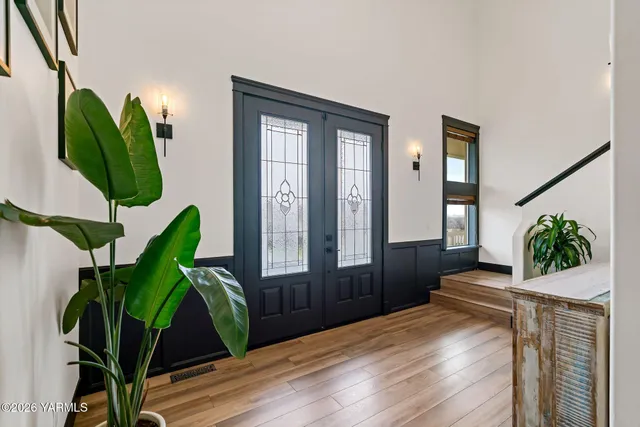 a view of an entryway with chandelier