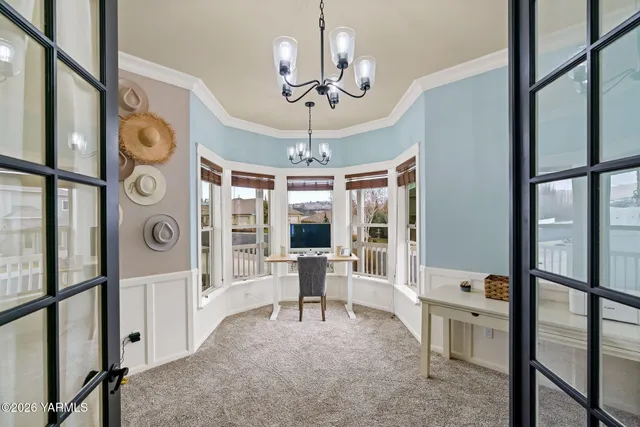 a living room with furniture fireplace and flat screen tv