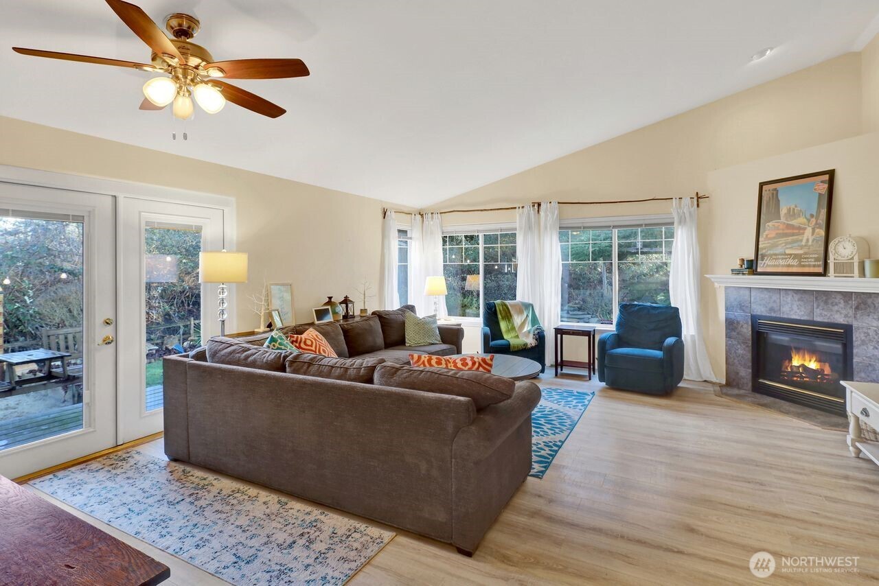 840 Nevada Street Bellingham, WA 98229 - Photo 14 of 38 a living room with furniture and a fireplace
