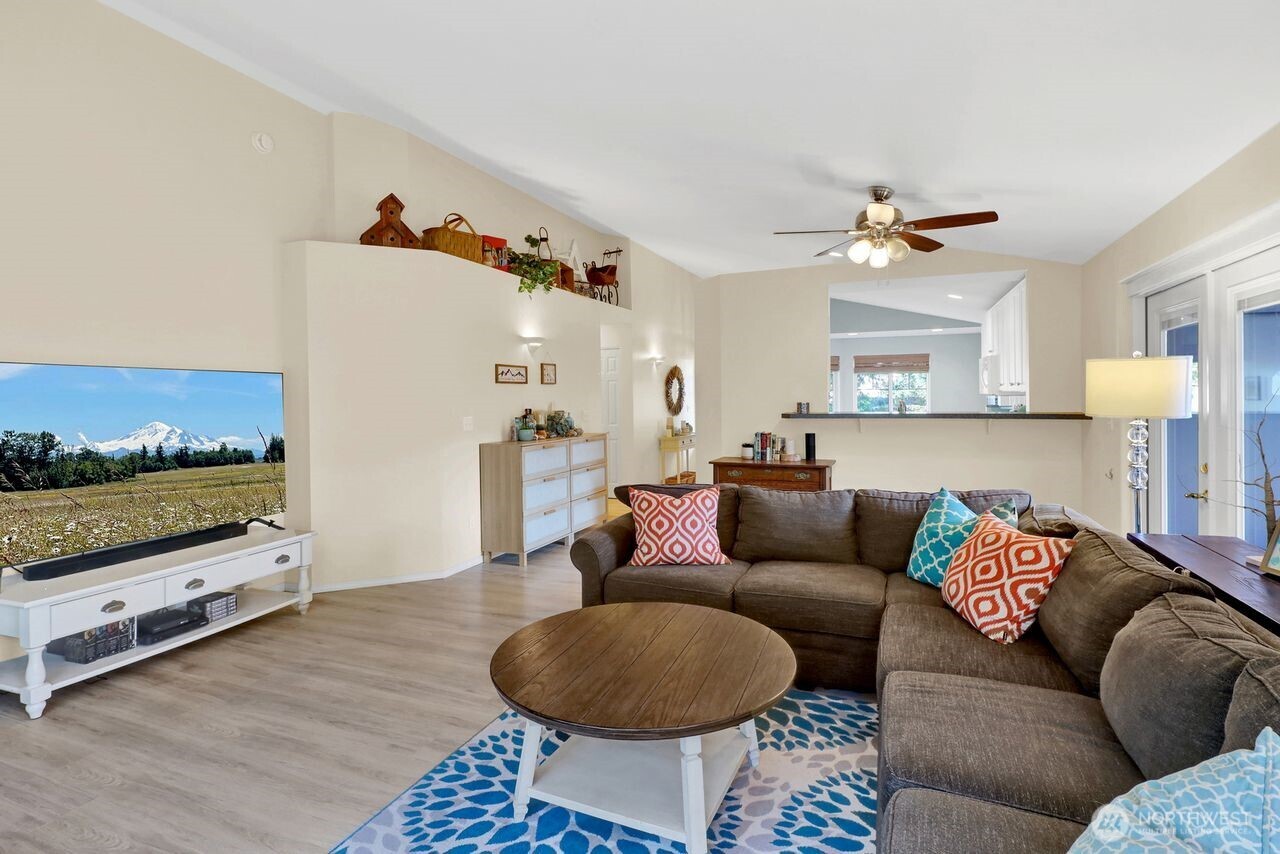 840 Nevada Street Bellingham, WA 98229 - Photo 16 of 38 a living room with furniture and a flat screen tv