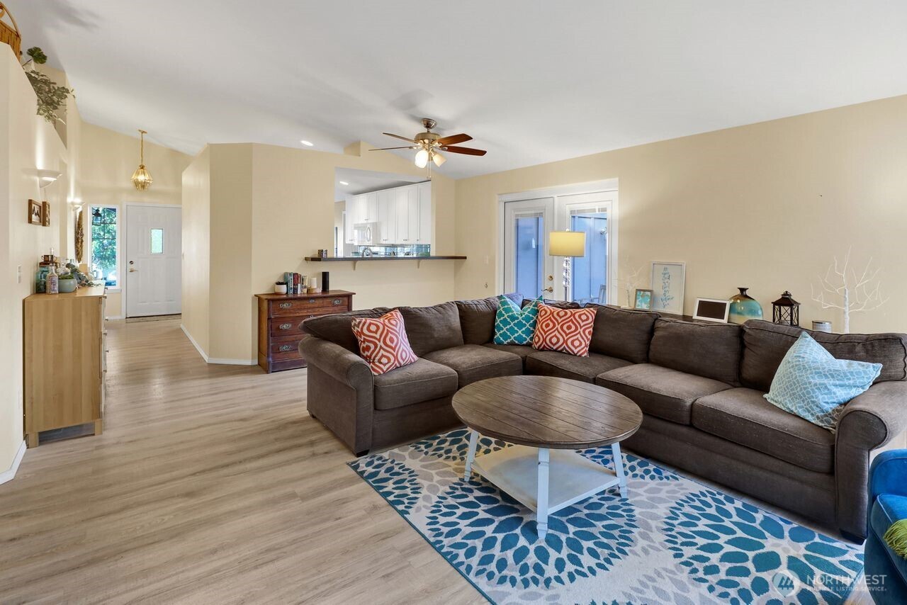 840 Nevada Street Bellingham, WA 98229 - Photo 17 of 38 a living room with furniture and a wooden floor