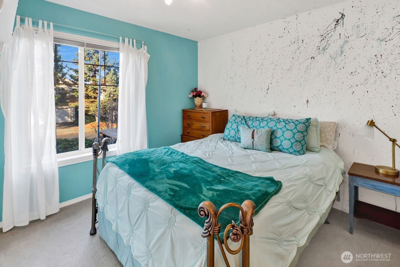 840 Nevada Street Bellingham, WA 98229 - Photo 23 of 38 a bedroom with bed and a window