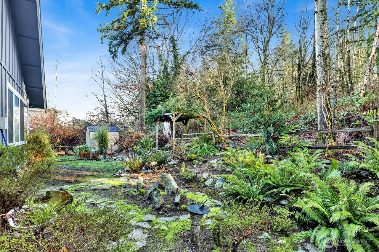 840 Nevada Street Bellingham, WA 98229 - Photo 36 of 38 a view of a garden with a building