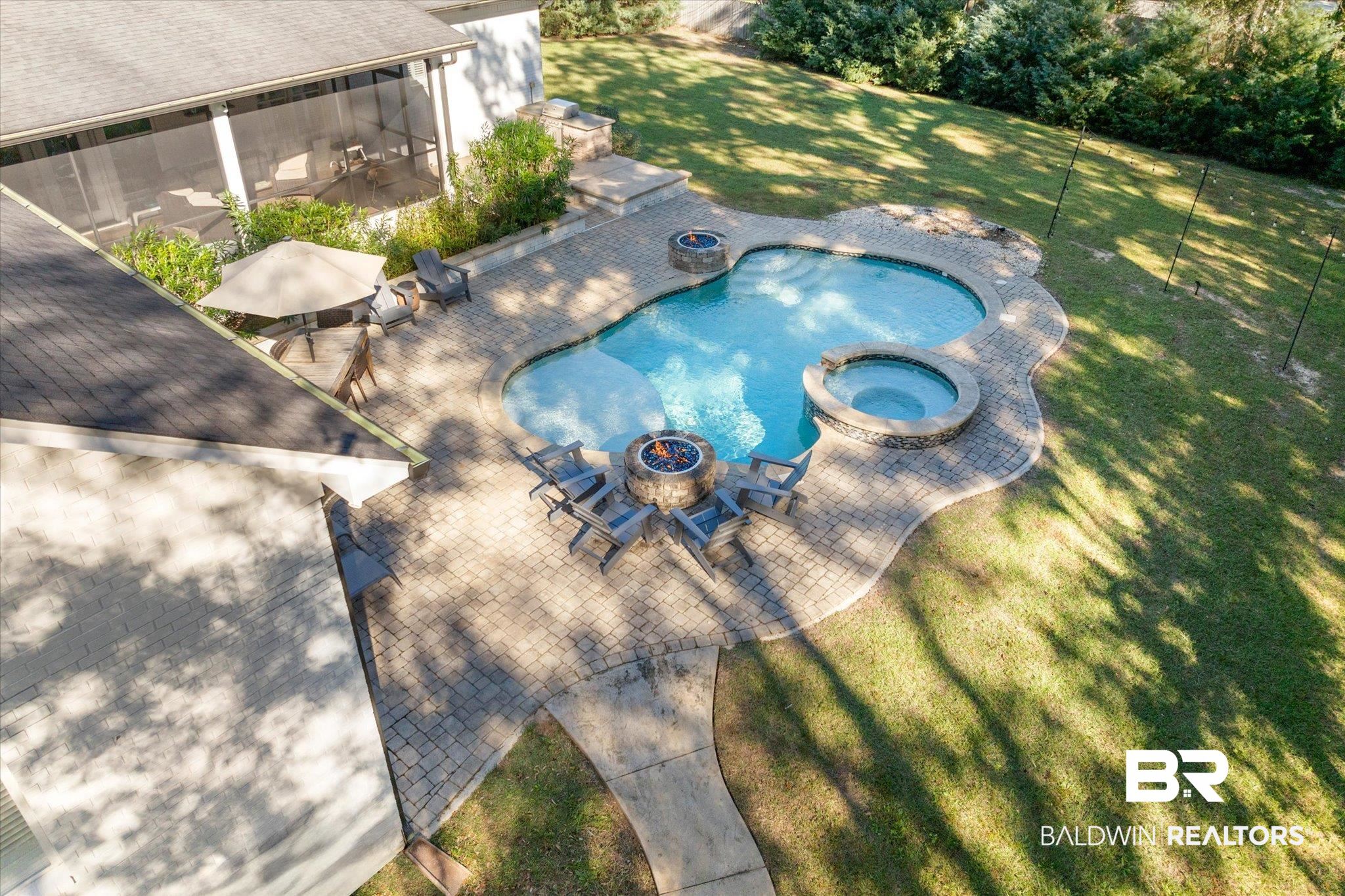3713 Old Shell Road Mobile, AL 36608 - Photo 43 of 52 View of pool featuring a patio area, a yard, and an in ground hot tub