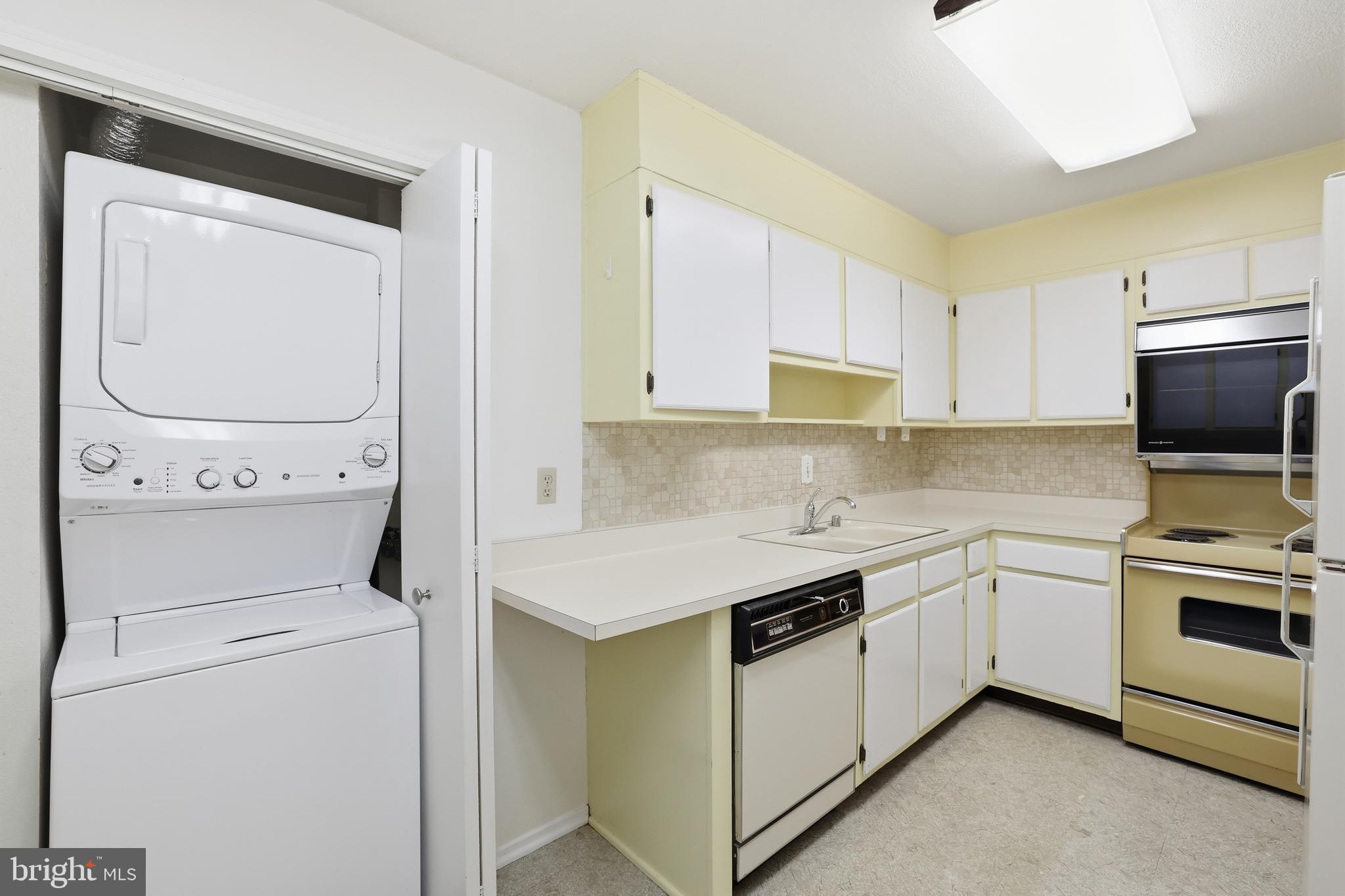 6101 Edsall Road, Unit 502 Alexandria, VA 22304 - Photo 13 of 33 In-unit laundry with new washer-dryer