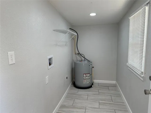 a view of an empty room with window