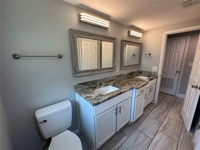 a view of yard with swimming pool and outdoor seating