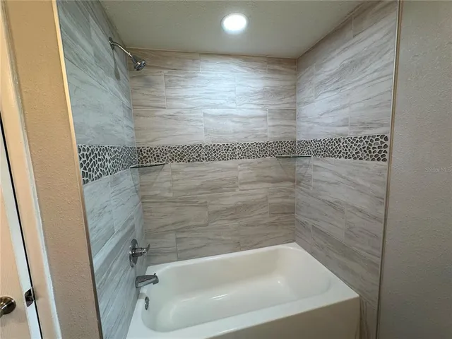 a house with trees in the background