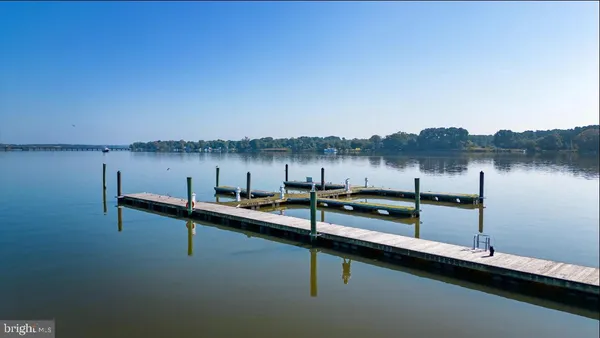 a view of a lake with sitting area