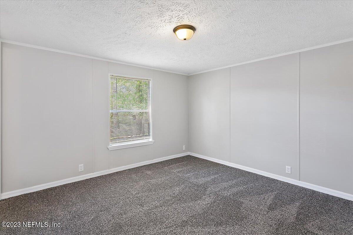 5191 County Road 23B Macclenny, FL 32063 - Photo 5 of 11 a view of room with window