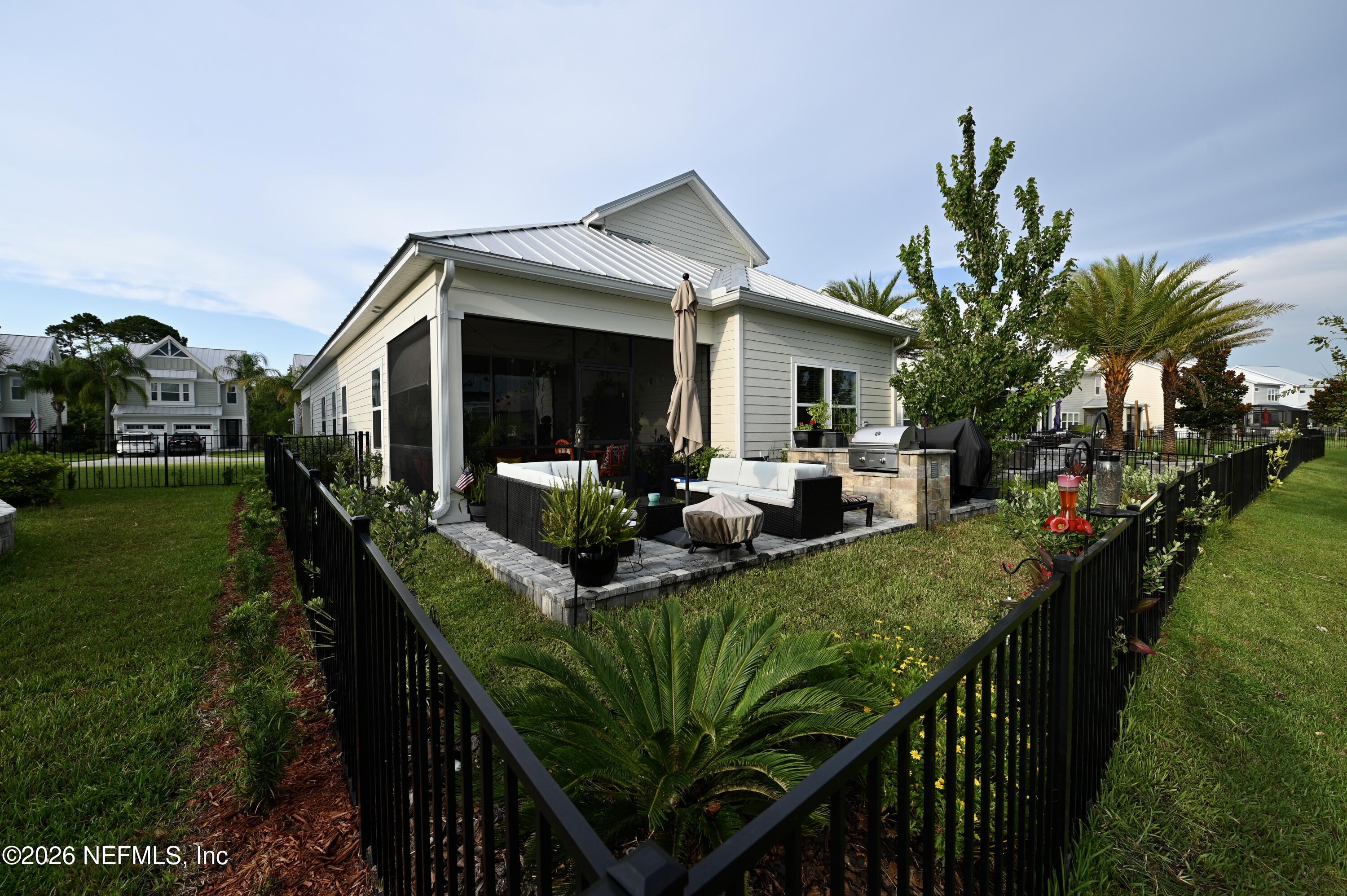 147 Clifton Bay Loop St. Johns, FL 32259 - Photo 11 of 34 a view of a house with backyard and sitting area