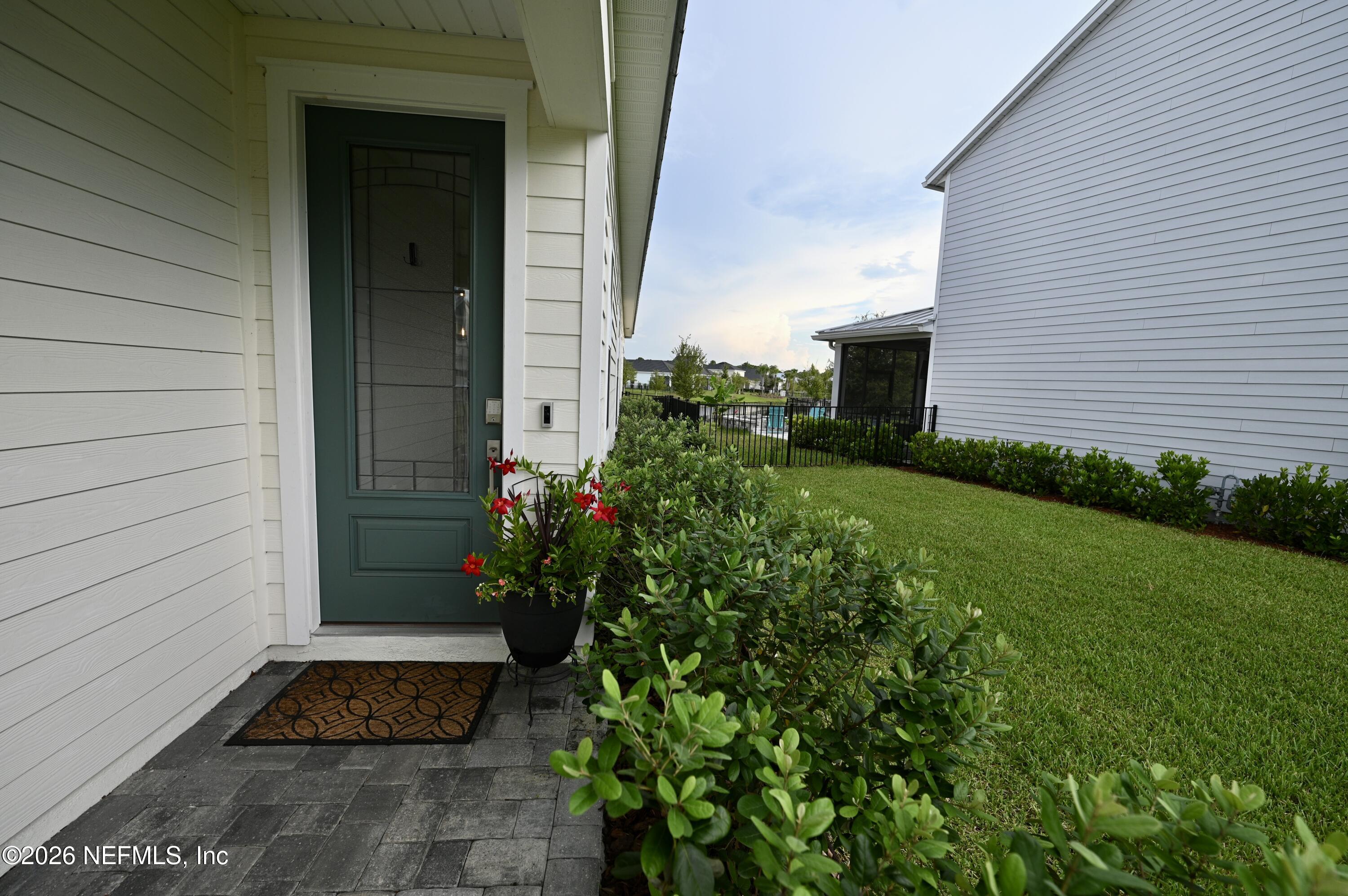 147 Clifton Bay Loop St. Johns, FL 32259 - Photo 13 of 34 a view of a house with a backyard