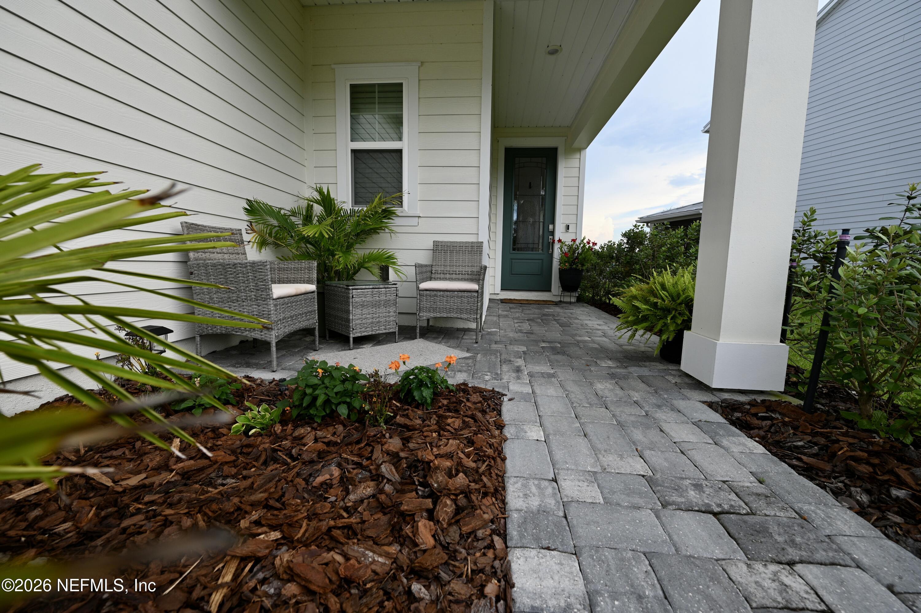 147 Clifton Bay Loop St. Johns, FL 32259 - Photo 18 of 34 a view of a pathway with flower plants