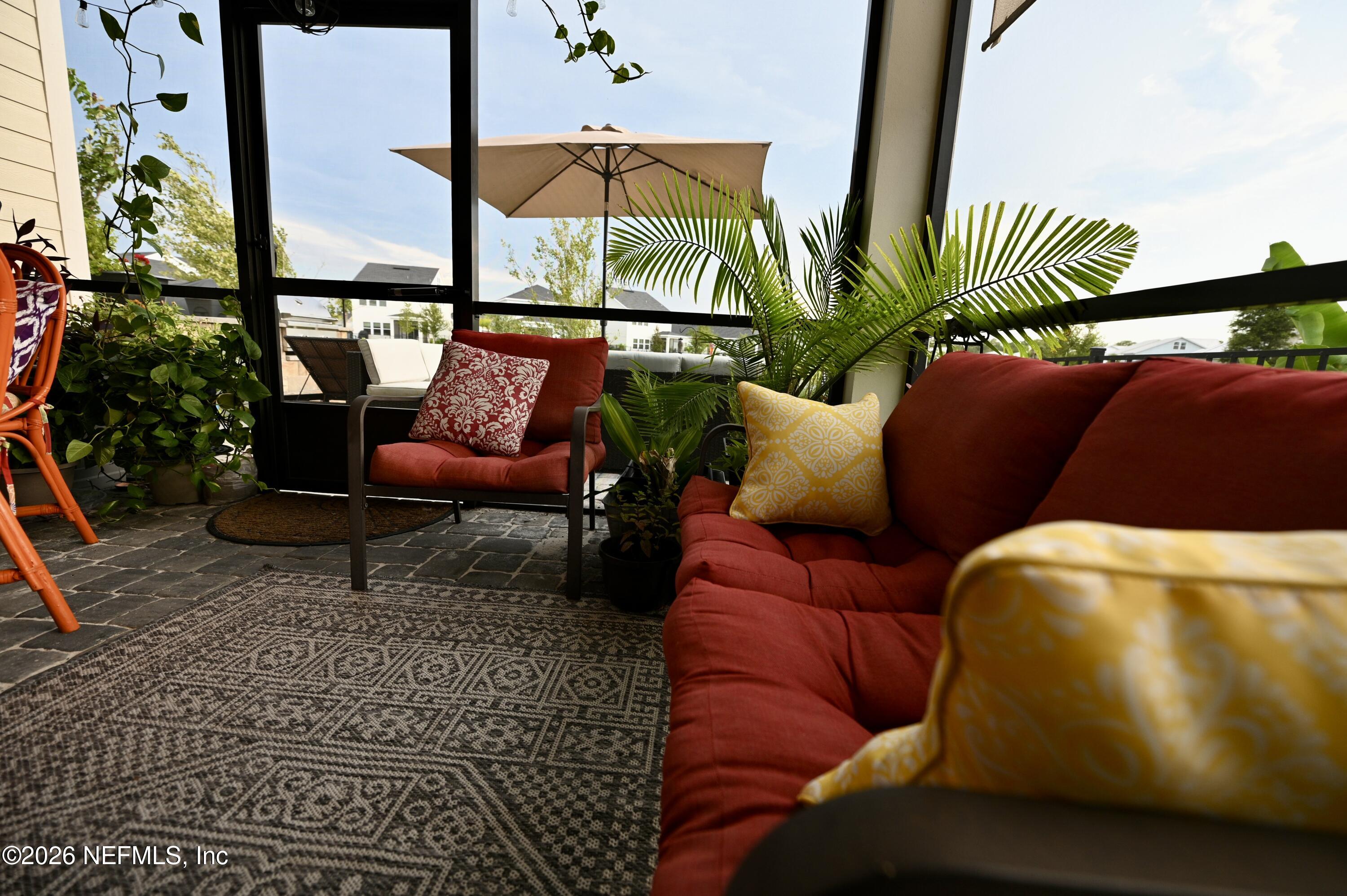 147 Clifton Bay Loop St. Johns, FL 32259 - Photo 7 of 34 a outdoor living room with furniture