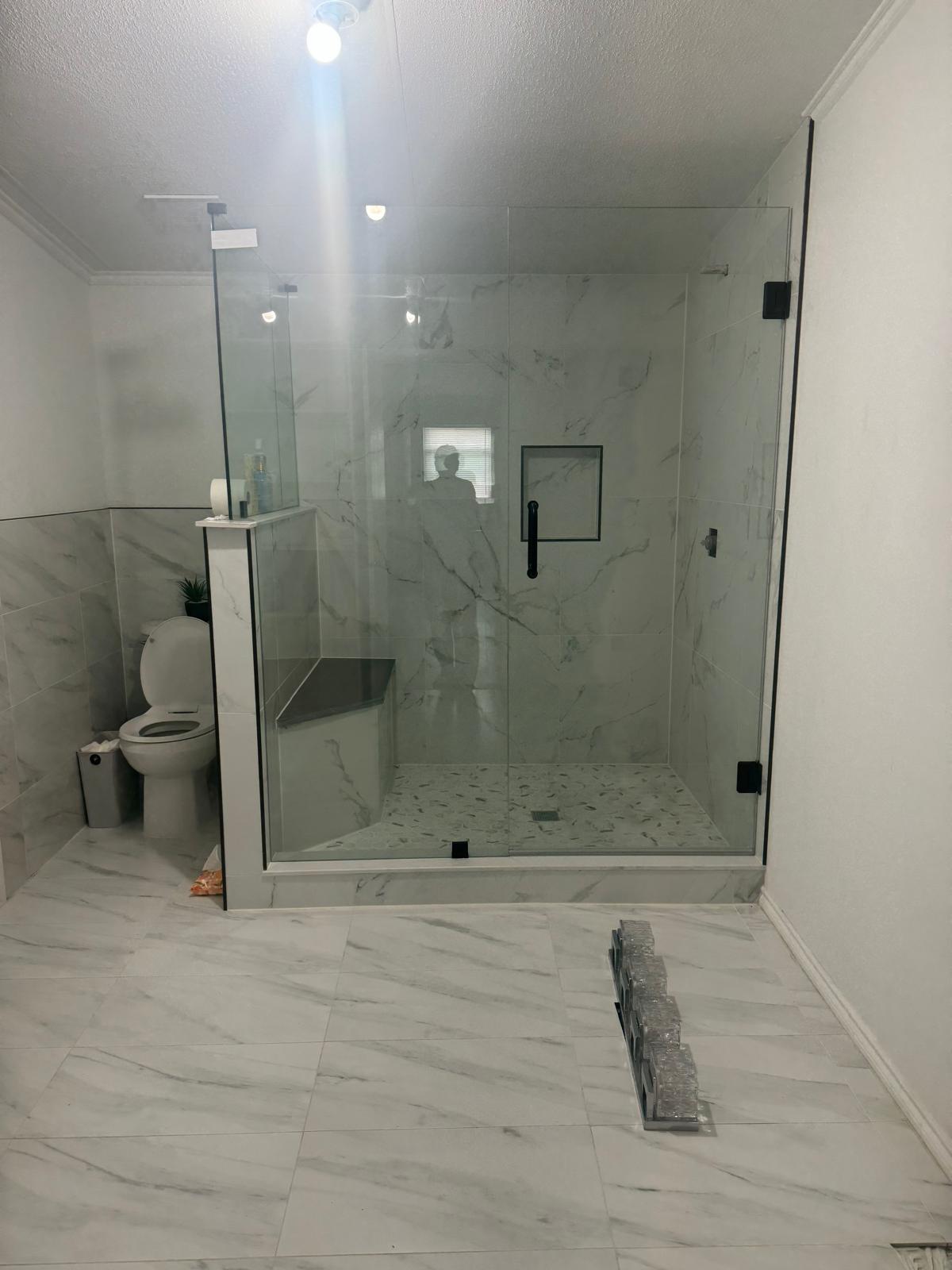 401 Ride Out Boulevard Elgin, TX 78621 - Photo 9 of 11 a bathroom with a shower