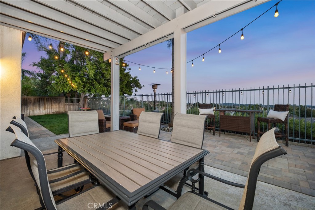 22 Sierra Blanco Lake Forest, CA 92610 - Photo 16 of 47 a view of a patio with a table and chairs