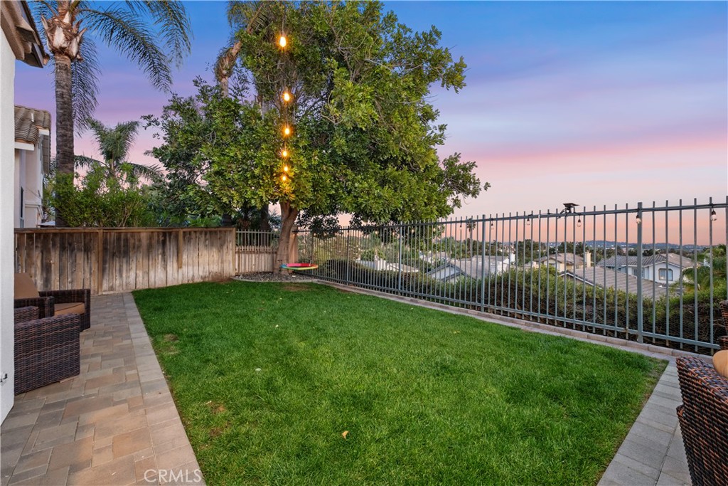 22 Sierra Blanco Lake Forest, CA 92610 - Photo 18 of 47 a view of a backyard with a lake view