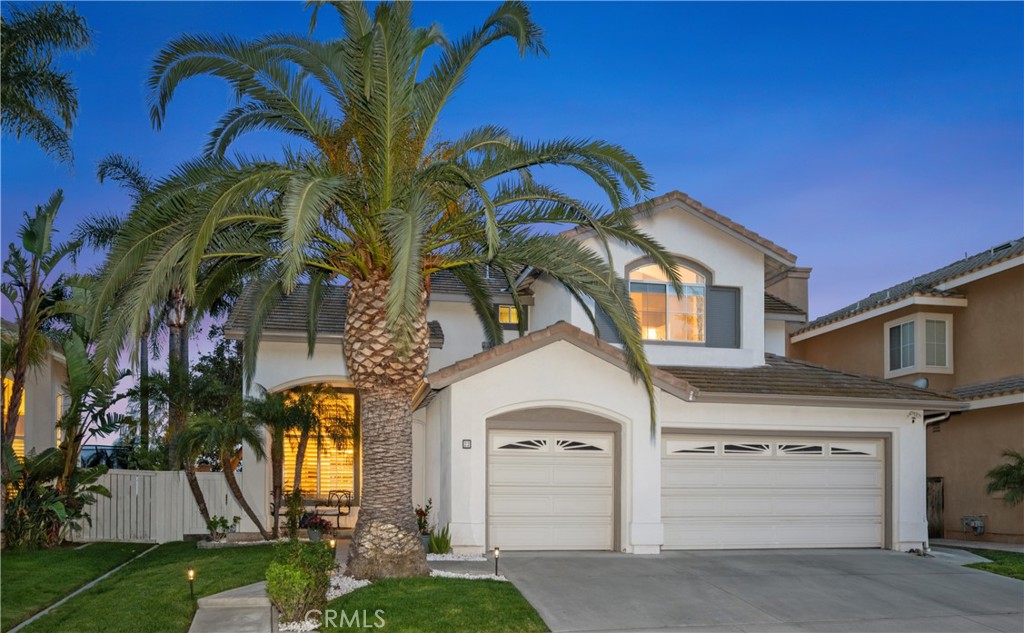 22 Sierra Blanco Lake Forest, CA 92610 - Photo 3 of 47 front view of a house with a yard
