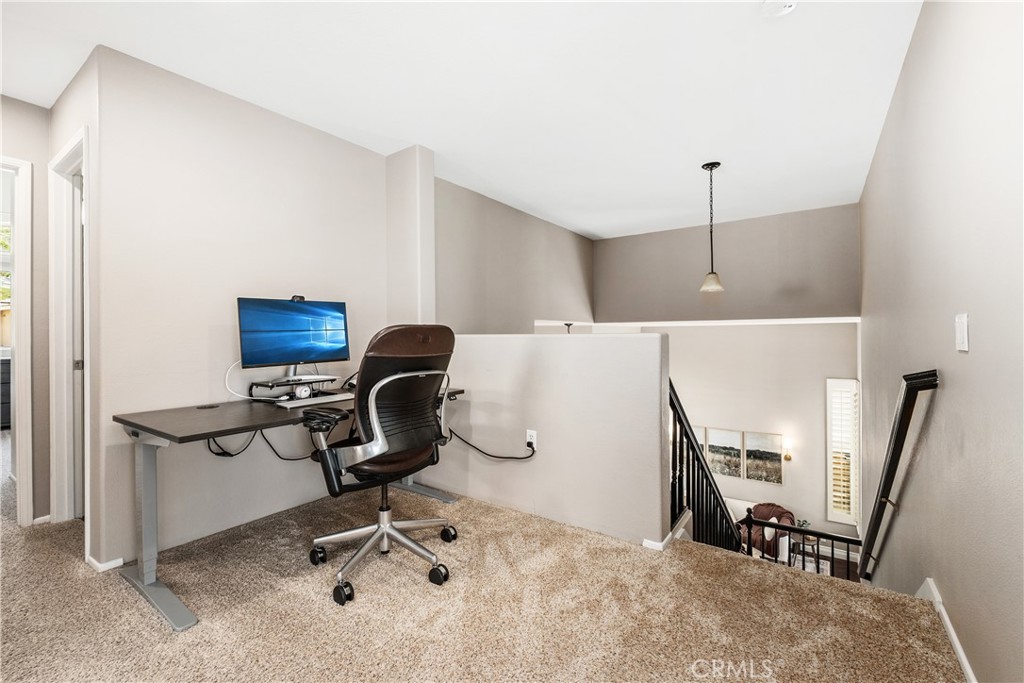 22 Sierra Blanco Lake Forest, CA 92610 - Photo 37 of 47 a workspace with furniture and a window