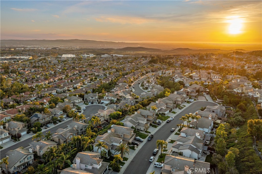 22 Sierra Blanco Lake Forest, CA 92610 - Photo 41 of 47 an aerial view of residential building with green space