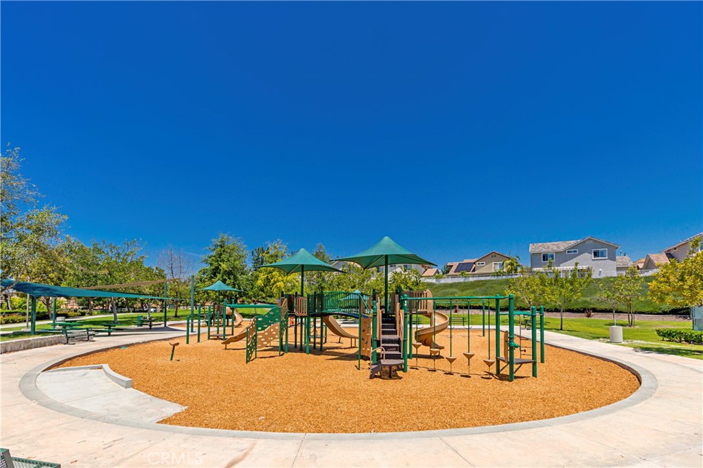 22 Sierra Blanco Lake Forest, CA 92610 - Photo 44 of 47 a view of a swimming pool with an outdoor seating