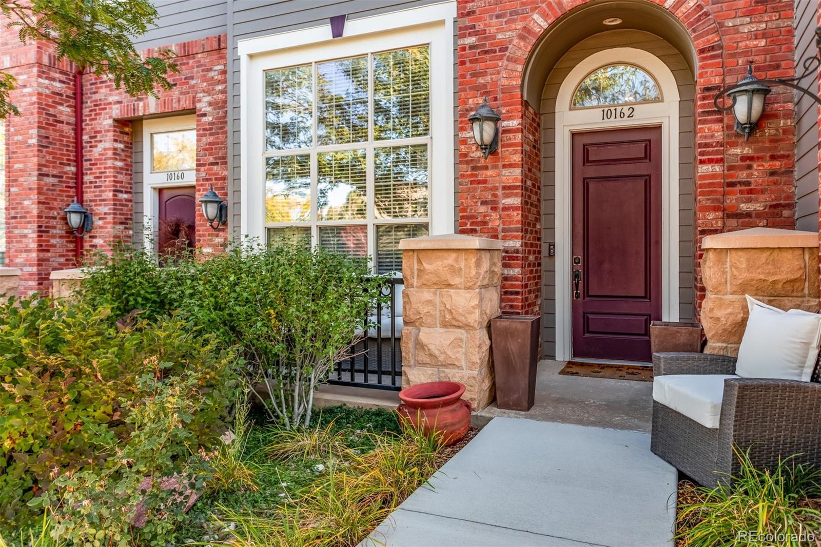 10162 RidgeGate Circle Lone Tree, CO 80124 - Photo 1 of 24 a house view with a outdoor space