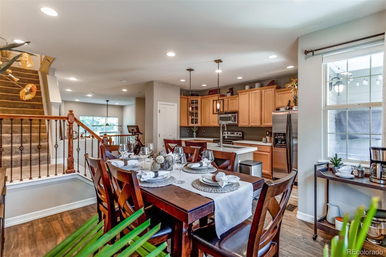 10162 RidgeGate Circle Lone Tree, CO 80124 - Photo 20 of 24 a view of a dining area with furniture