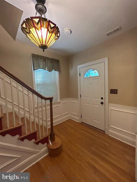 306 Kingston Road Baltimore, MD 21229 - Photo 2 of 17 a view of entryway with wooden floor