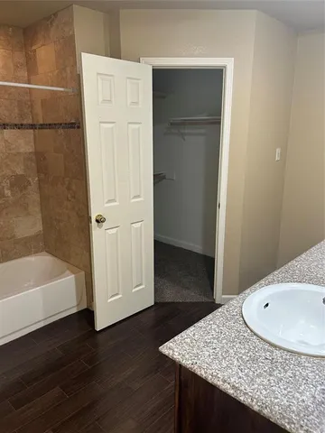 a bathroom with a sink and a tub