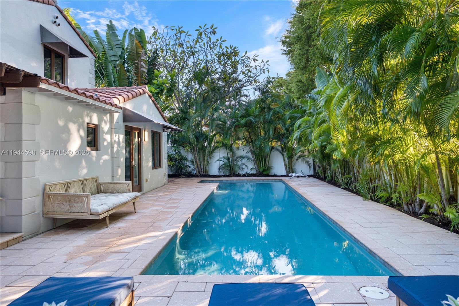 320 West 26th Street Miami Beach, FL 33140 - Photo 2 of 33 a view of a backyard with sitting area