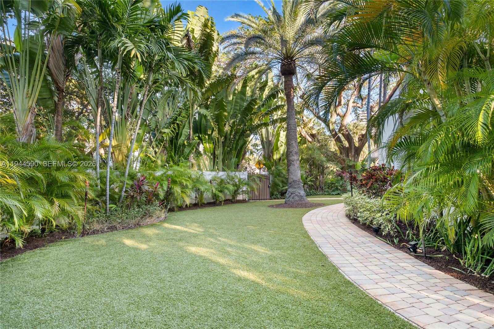 320 West 26th Street Miami Beach, FL 33140 - Photo 26 of 33 a view of a yard with plants and trees