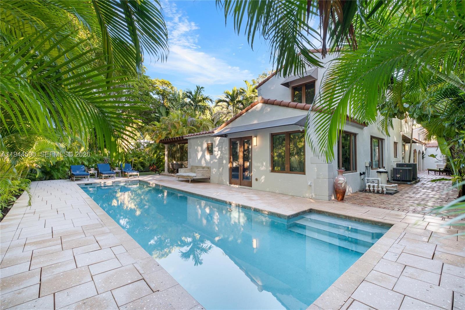 320 West 26th Street Miami Beach, FL 33140 - Photo 3 of 33 a view of a house with pool and sitting area