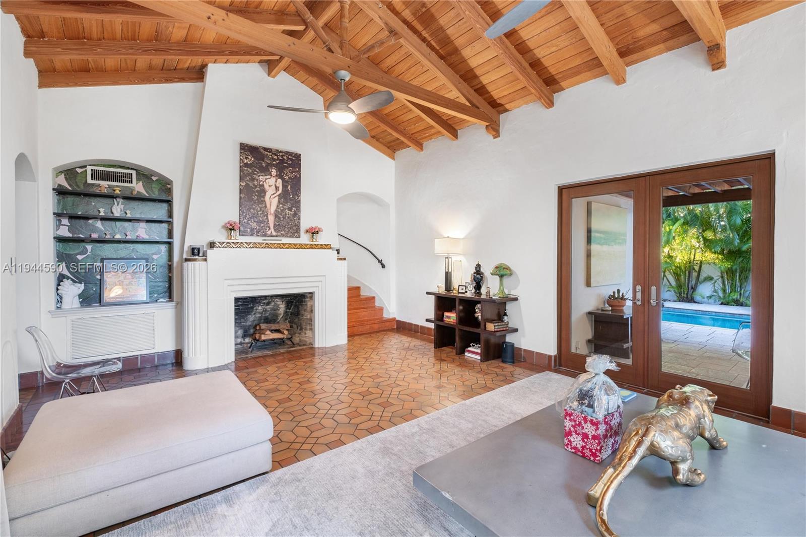 320 West 26th Street Miami Beach, FL 33140 - Photo 5 of 33 a living room with furniture and a fireplace