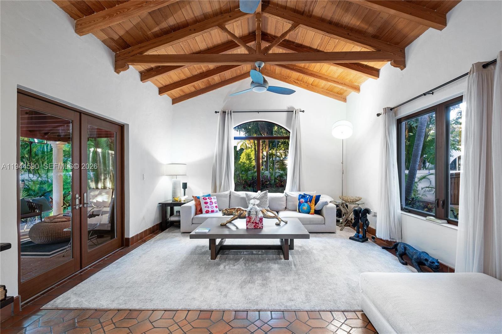 320 West 26th Street Miami Beach, FL 33140 - Photo 6 of 33 a living room with furniture and a large window