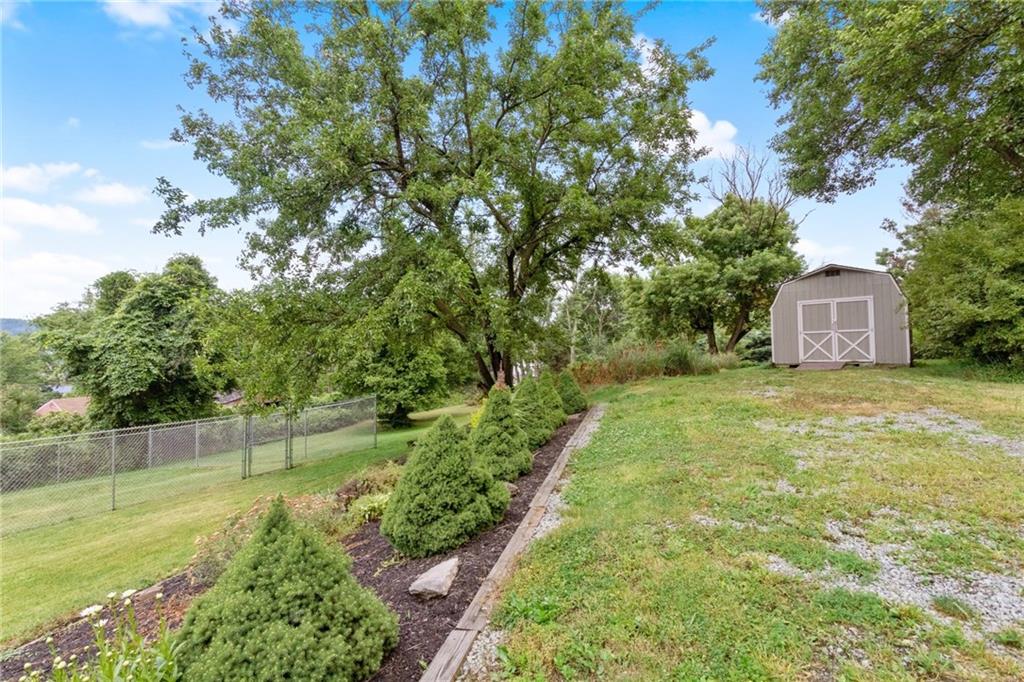 101 Unionville Road Freedom, PA 15042 - Photo 21 of 25 The shed is up at the top of the yard, this space is also good for an overflow of company for parking.