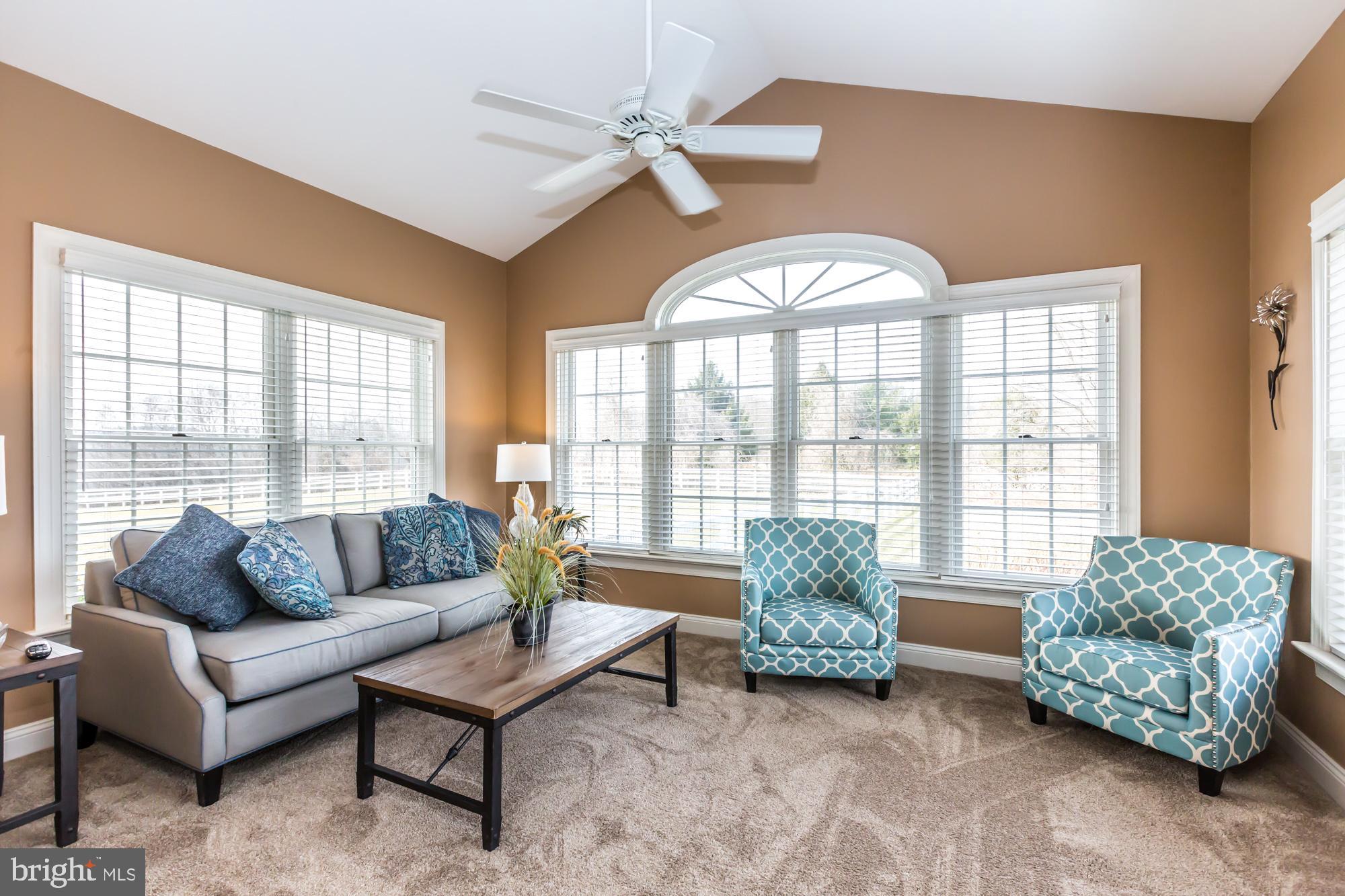 805 North Reeds Road Downingtown, PA 19335 - Photo 9 of 66 Solarium/lake view & vaulted ceiling/fan