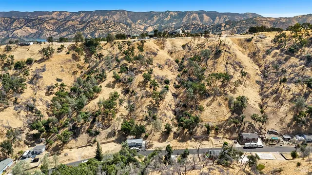 a view of yard covered with snow in outdoor