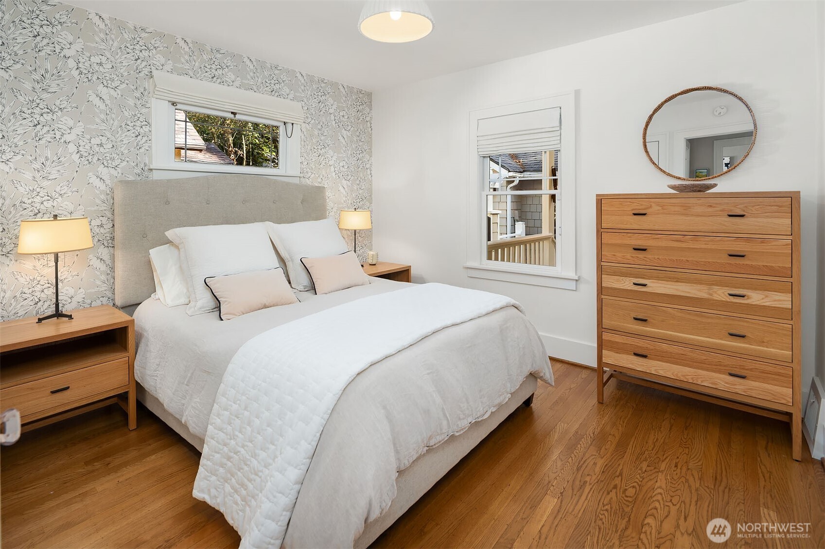 6838 30th Avenue Northeast Seattle, WA 98115 - Photo 17 of 34 a bedroom with a bed and a dresser