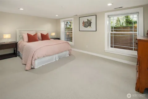 a bathroom with a sink a vanity and a mirror