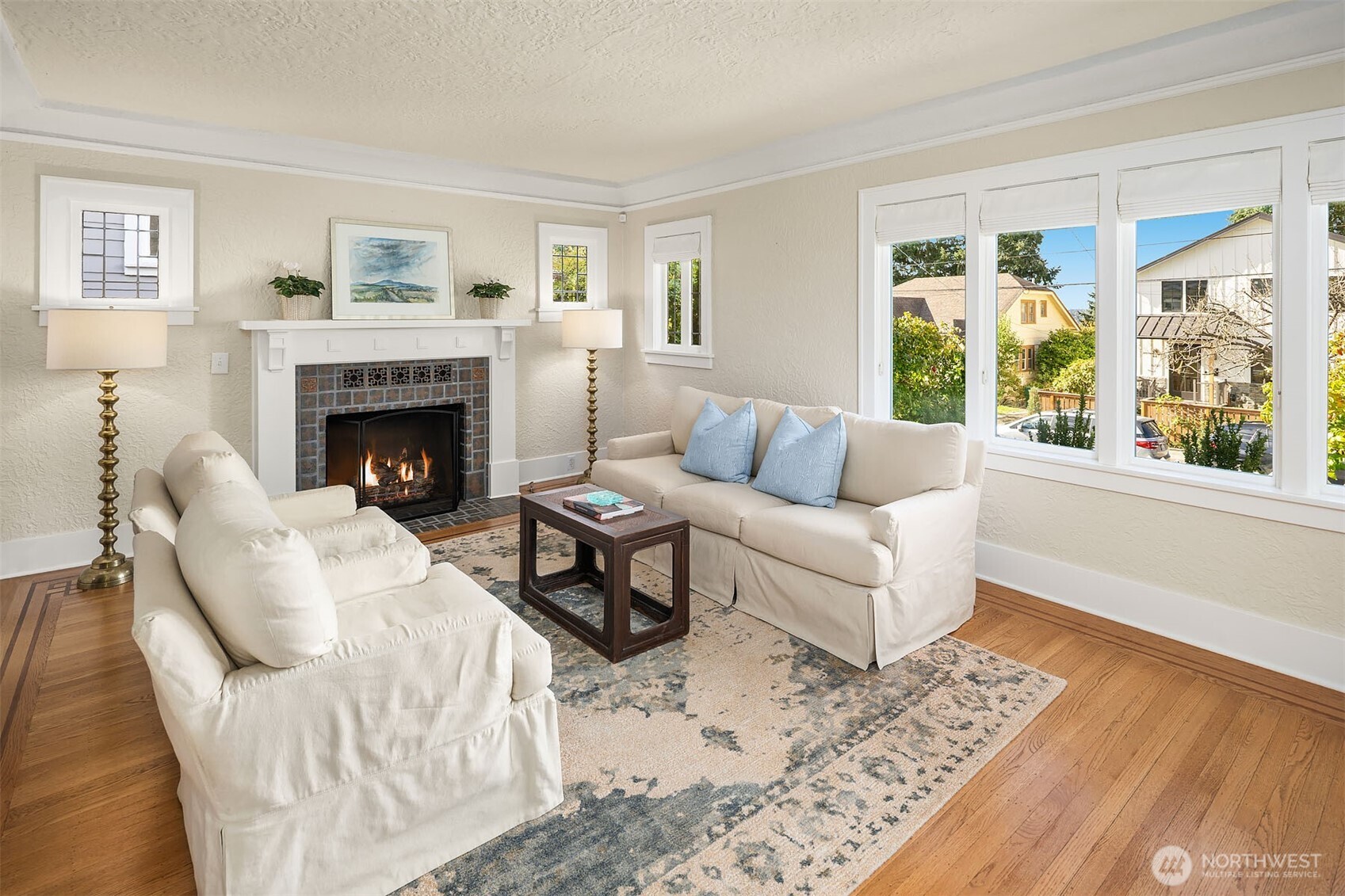 6838 30th Avenue Northeast Seattle, WA 98115 - Photo 5 of 34 a living room with furniture and a fireplace