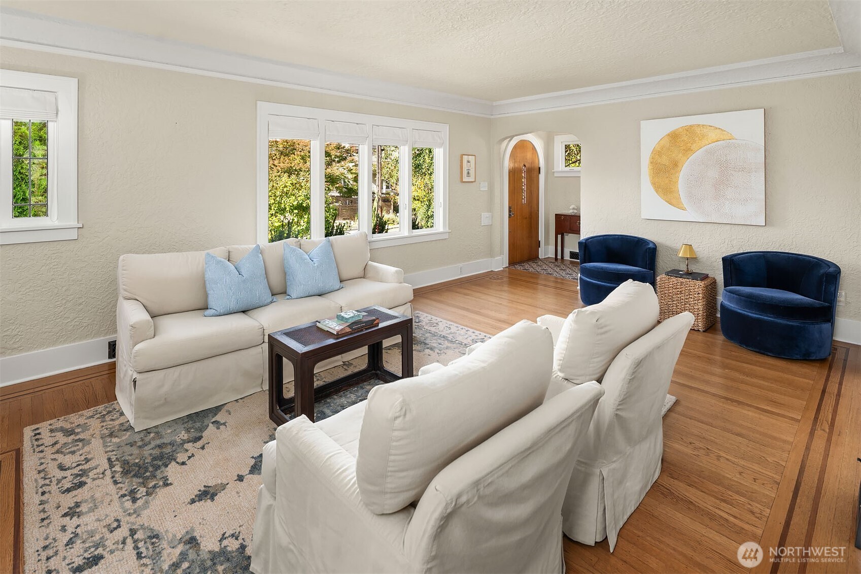 6838 30th Avenue Northeast Seattle, WA 98115 - Photo 6 of 34 a living room with furniture and a window