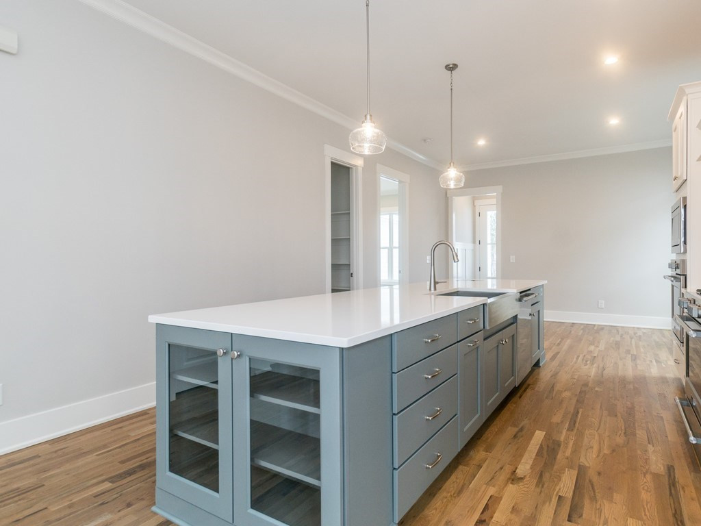 732 Daniel Ridge Rd., Unit LT967 Wendell, NC 27591 - Photo 12 of 28 Oversized island is wonderful for entertaining and ffood prep. Island also features built in cabinets. Oversized Island